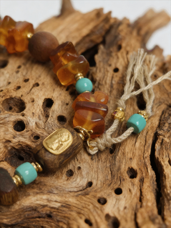 Amber Dawn & Agarwood Earthheart Bracelet – Pangu Edition Detail Detail of Amber Dawn and Agarwood Earthheart Bracelet Pangu Edition with amber stones natural wood beads and hand tied cord