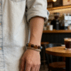 Amber Dawn & Agarwood Earthheart Bracelet – Pangu Edition Lifestyle Style Amber Dawn and Agarwood Earthheart Bracelet Pangu Edition worn on wrist in casual lifestyle setting