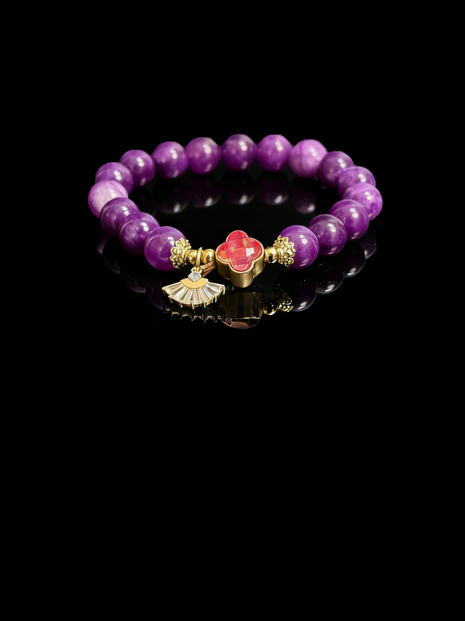Nüwa inspired Blessed Heart amethyst bracelet (11mm) with purple beads, gold accents and a red heart charm photographed on a black reflective background