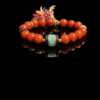 Bound Resolve red agate bracelet (10mm) featuring glossy natural red agate beads, turquoise-style centerpiece and colorful tassel detail, Xingtian inspired handmade statement jewelry