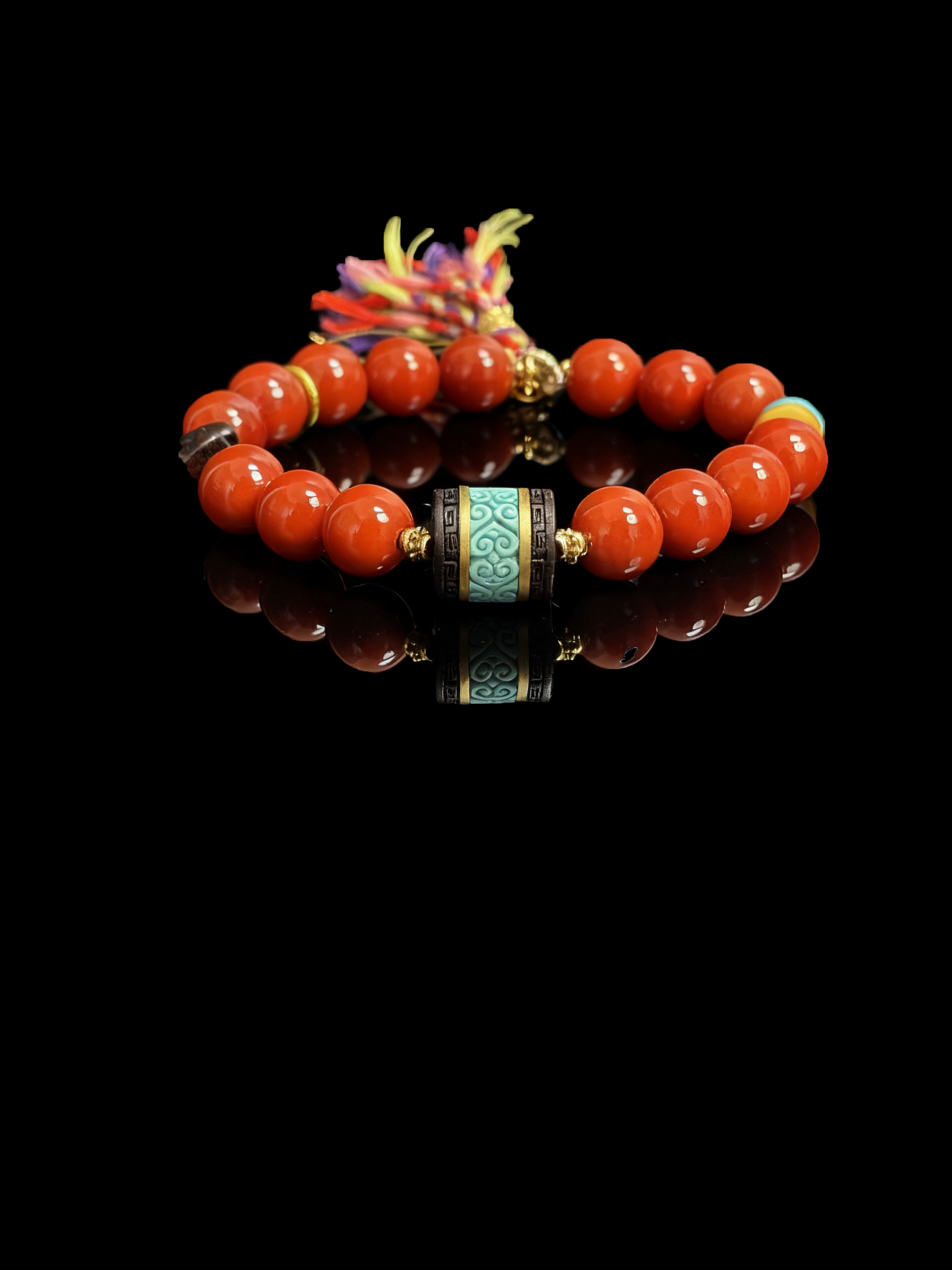 Bound Resolve red agate bracelet (10mm) featuring glossy natural red agate beads, turquoise-style centerpiece and colorful tassel detail, Xingtian inspired handmade statement jewelry