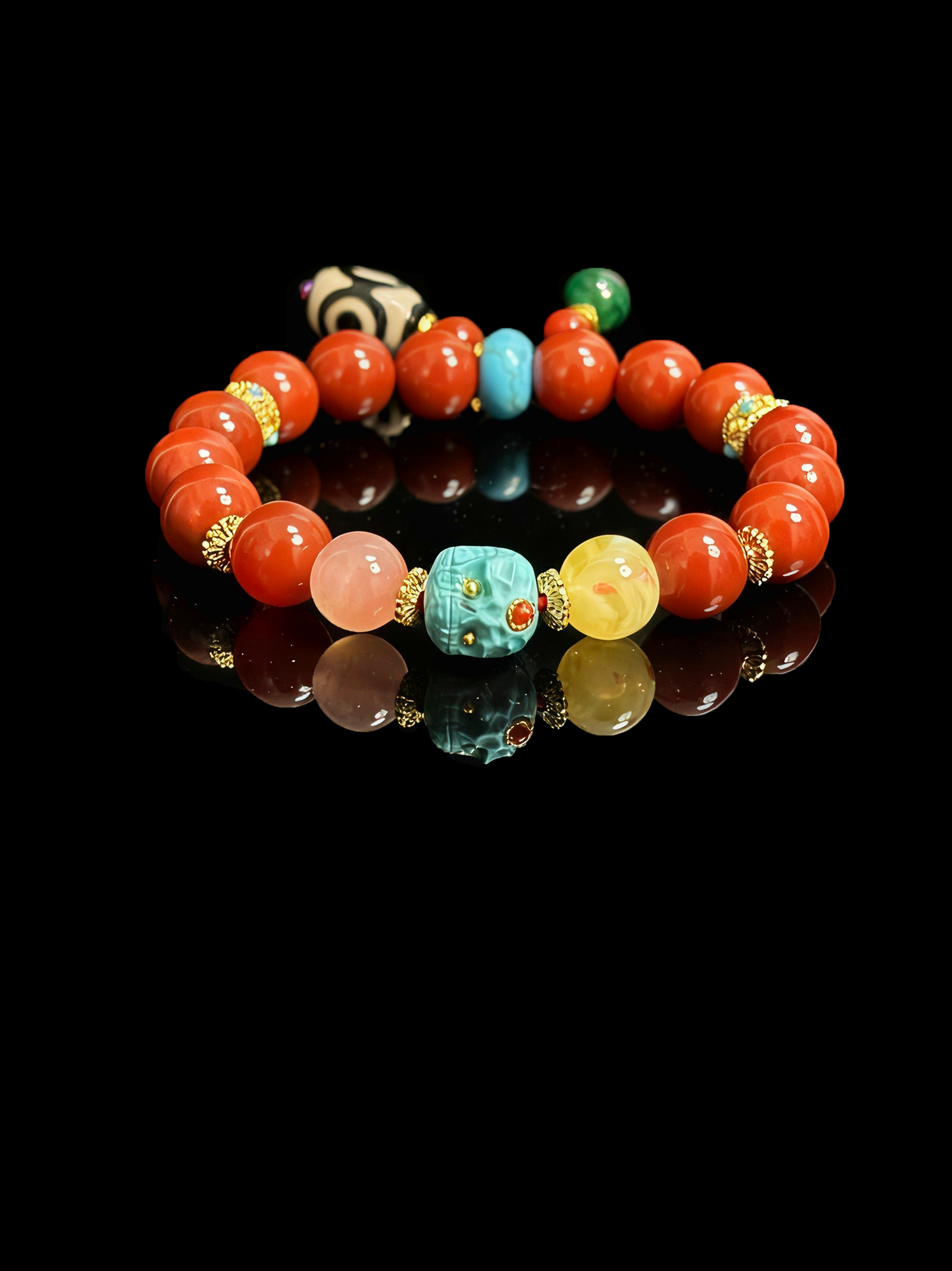 Crimson Fury & Turquoise Totem Bracelet – Xingtian Myth Collection (10mm), featuring vibrant crimson agate beads, a carved turquoise totem centerpiece, natural gemstone accents, and gold spacers, inspired by the fearless warrior Xingtian and symbolizing courage, resilience, and unbreakable will