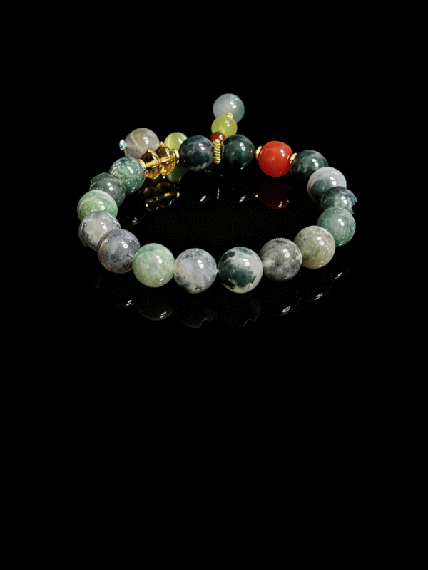 Field Apothecary Bracelet – Shennong Inspired (10mm) featuring green moss agate beads with natural marbling and herbal earth-tone accents on a black background