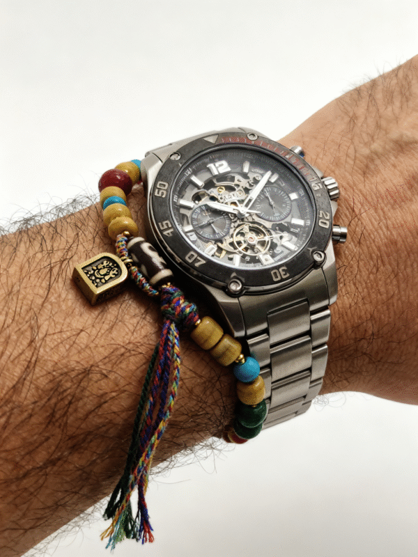 Detailed view of Pangu’s Primordial Ethereal Bone-Agate Bracelet on wrist, featuring bone-style bead, agate stones, and protective charm