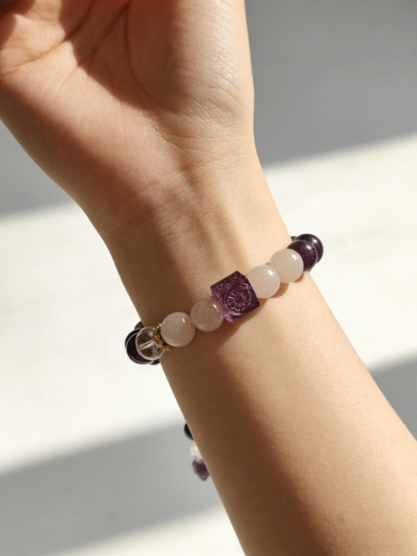 Settled Order Bracelet – Nüwa Inspired Elegant Mythic Bracelet Styling (11mm) Lifestyle wrist shot of the Settled Order Bracelet inspired by Nüwa, showcasing purple amethyst, white agate, and crystal beads with a refined, balanced aesthetic