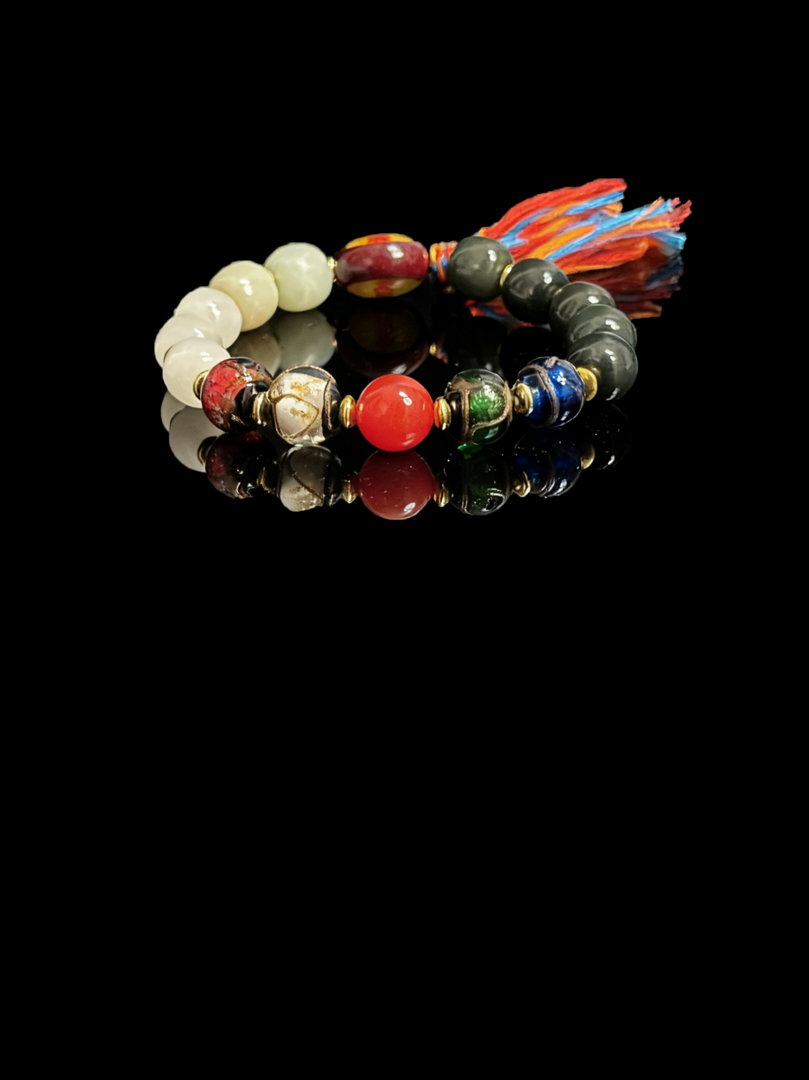Turbulent Elemental Agate Bracelet Gonggong Inspired 10mm with multicolored agate beads and tassel detail