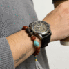 Agarwood War-Totem Agate Bracelet Xingtian Edition 10mm worn on men’s wrist in casual lifestyle setting