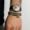 Man wearing Harmonizing Green Agate Bracelet Shennong Inspired 6mm with carved green agate centerpiece and natural stone beads
