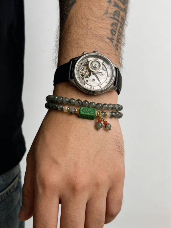 Man wearing Harmonizing Green Agate Bracelet Shennong Inspired 6mm with carved green agate centerpiece and natural stone beads