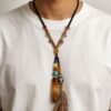 Pangu’s Sacred Origin Dzi Bead Necklace with Agate & Turquoise Pangu’s Sacred Origin Dzi Bead Necklace with Agate & Turquoise