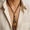 Pangu’s Sacred Origin Dzi Bead Necklace with Agate & Turquoise Pangu’s Sacred Origin Dzi Bead Necklace with Agate & Turquoise