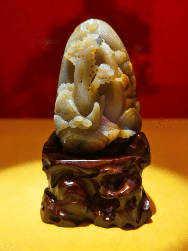 hand-carved stone collectible titled Eternal Pine Mountain, depicting pine-inspired forms rising from a mountain-shaped composition on a carved base