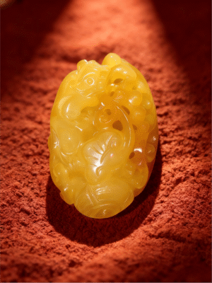 Handheld Agate Artwork titled Guardian of Fortune, featuring a compact guardian-like form carved in translucent golden agate