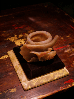 Handheld agate Leaf Whisper Cup with flowing leaf-inspired form, handcrafted handheld agate artwork