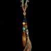 Primordial Layered Agate and Dzi pendant necklace inspired by Pangu mythology, featuring a natural layered agate pendant, traditional Dzi bead, turquoise accent beads, and multicolored hand-wrapped tassel on a black cord