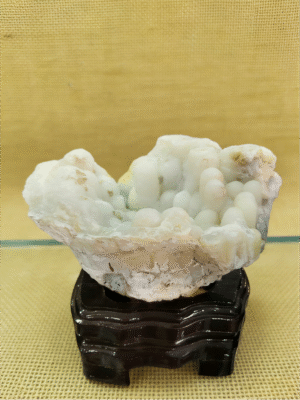 natural mineral collectible titled White Cloud Basin, featuring soft white stone formations shaped like a cloud-filled basin