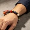 Gonggong’s Turbulent Elemental Black Agate Bracelet with Liuli (10mm)