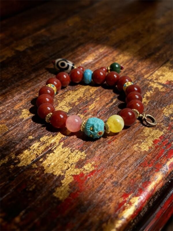 Xingtian’s Crimson Fury Red Agate Bracelet with Turquoise & Dzi (10mm) Xingtian’s Crimson Fury Red Agate Bracelet with Turquoise & Dzi (10mm)