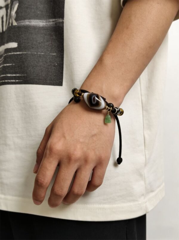 Gonggong’s Turbulent Black Dzi & Agarwood Pendant Necklace