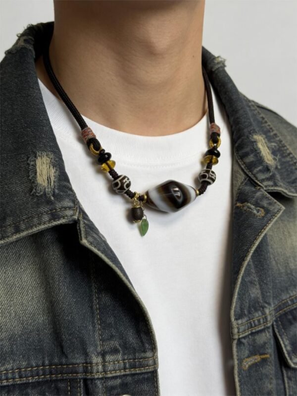 Gonggong’s Turbulent Black Dzi & Agarwood Pendant Necklace