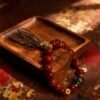 Xingtian’s Scarlet Agate Bracelet Detail Shot – Emblem of Strength and Courage Xingtian’s Scarlet Red Agate Bracelet with Agarwood (10mm)